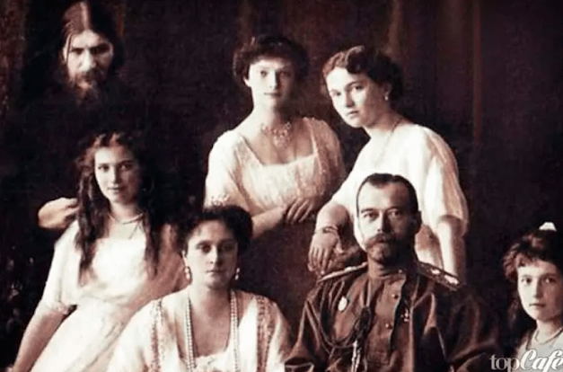 A photo of Nicholas II family with Grigori Rasputin.